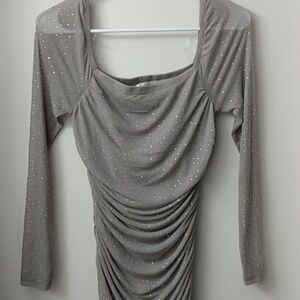 Below knee length evening dress, camel color sheer sleeves but lined bodice, med